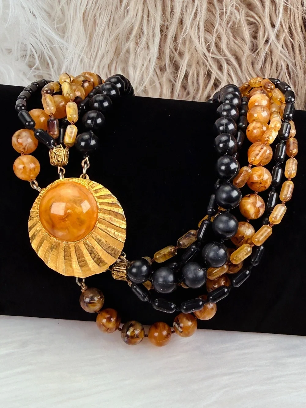 Vintage Multi Strand Black Amber Tone Bead Necklace Gold Tone Centerpiece